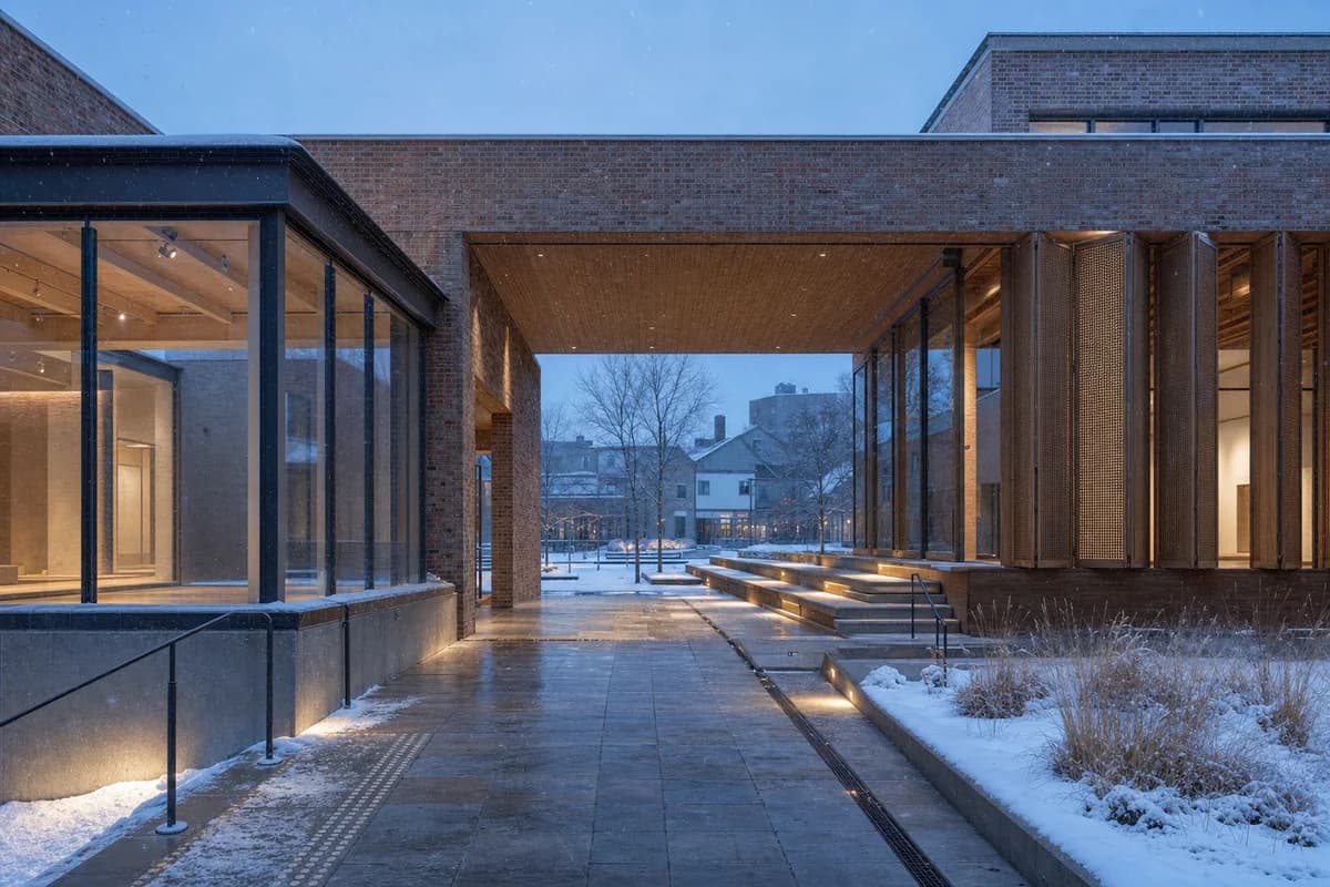 A second candidate of the same winter arts center square with identical camera, geometry, activity, time, lighting, and conditions.