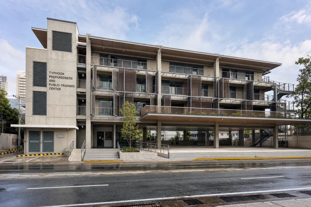 Precast typhoon preparedness center with operable screens in Manila.