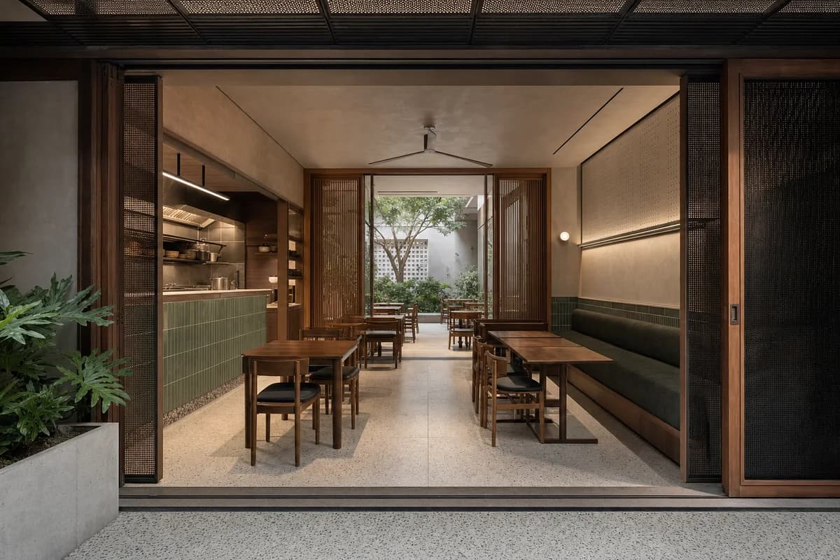 Monsoon Supper House, family eatery organized by sliding screens connecting two dining rooms to a wash court.