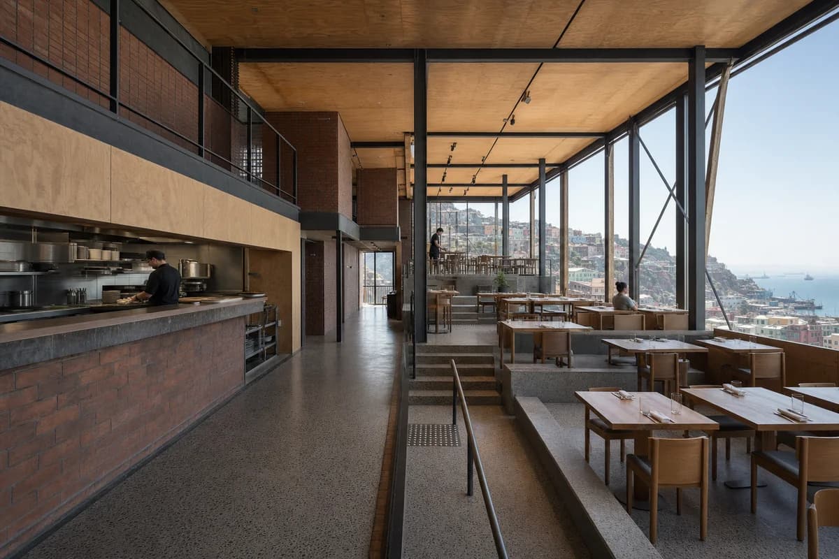 Split-Step Dining House, hillside restaurant organized by stepped dining terraces maintaining direct service routes.