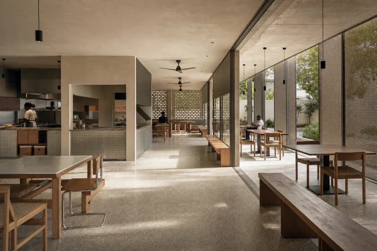 Veranda Stew House, neighborhood eatery organized by dining extending from an enclosed service core to a deep veranda.