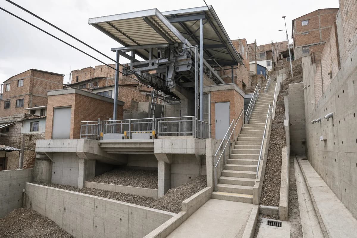 Concrete cable-car station integrated into a steep urban district.