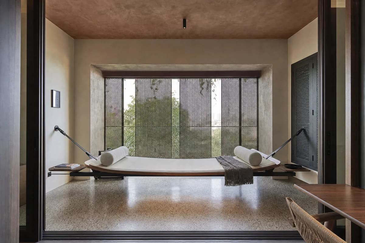 Canvas Sling Daybed, furniture shaping shaded loggia with a built-in daybed.
