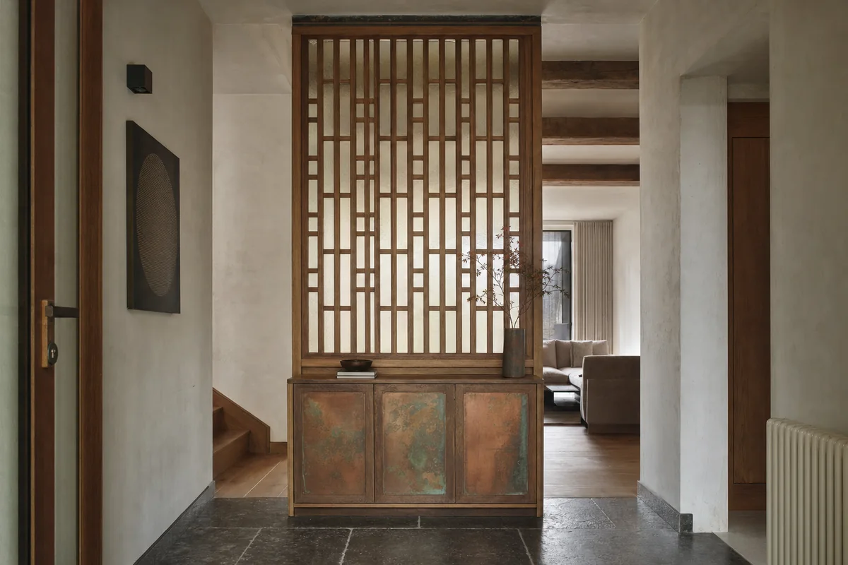 Copper Screen Cabinet, furniture shaping townhouse hall with a freestanding cabinet.