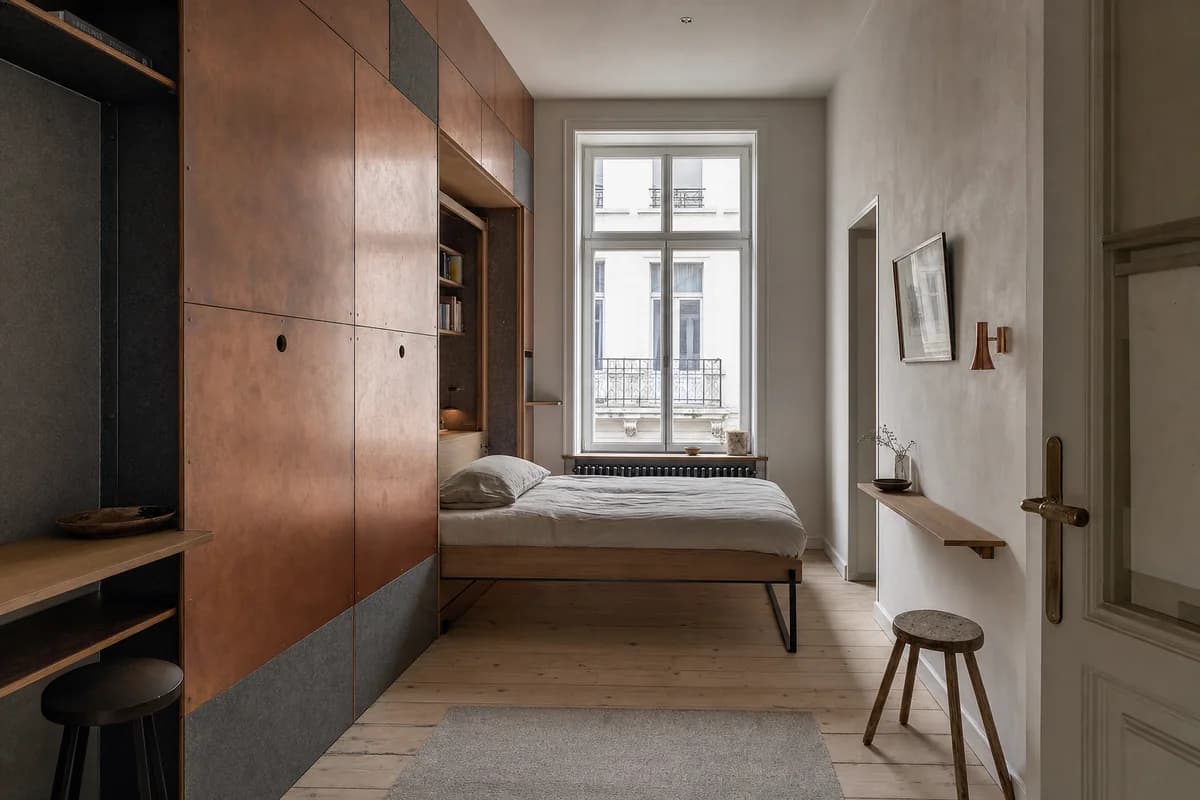Fold-Down Copper Bed, furniture shaping micro guest room with a wall bed.