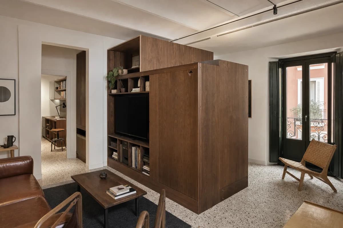 Leather-Clad Service Trunk, furniture shaping apartment living room with a storage trunk.
