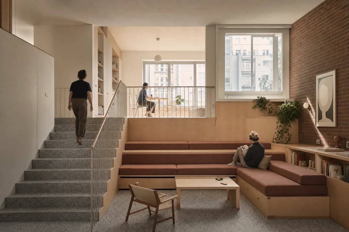 Stair-Sofa Commons, furniture shaping cooperative living room with stepped seating.