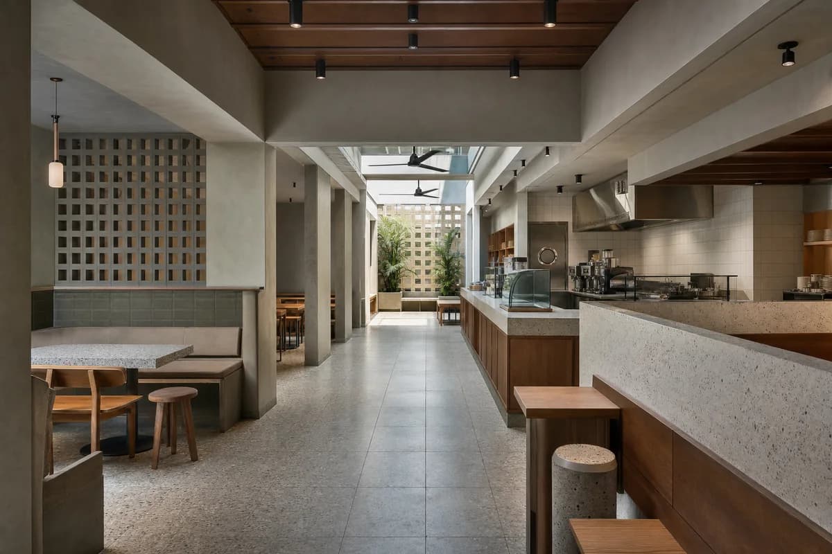 Breezeway Breakfast Bar, breakfast cafe organized by two shaded rooms flanking a cross-ventilated service spine.