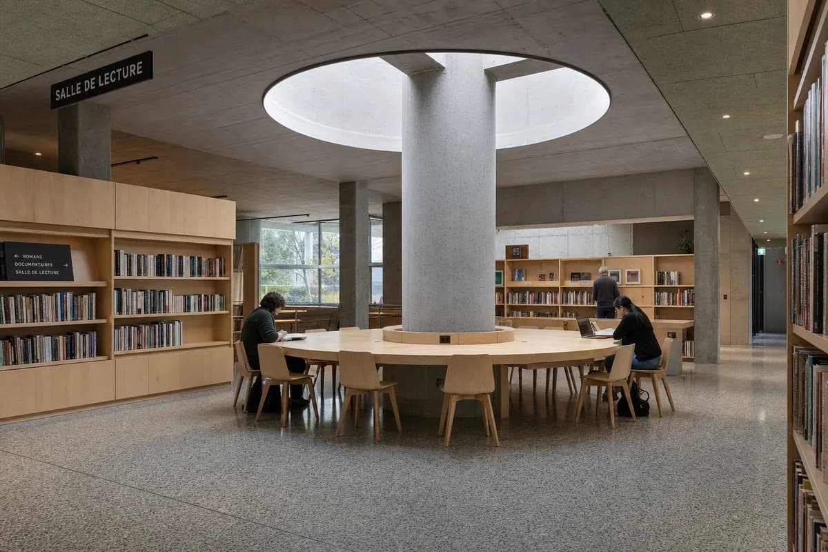 Reading Ring, furniture shaping civic reading room with a circular table.