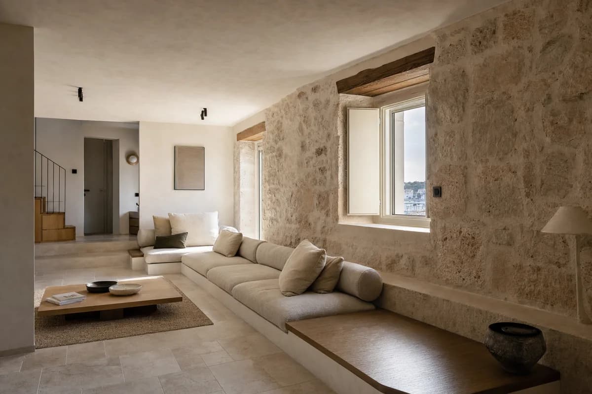Stone Ribbon Sofa, furniture shaping coastal living room with continuous seating.